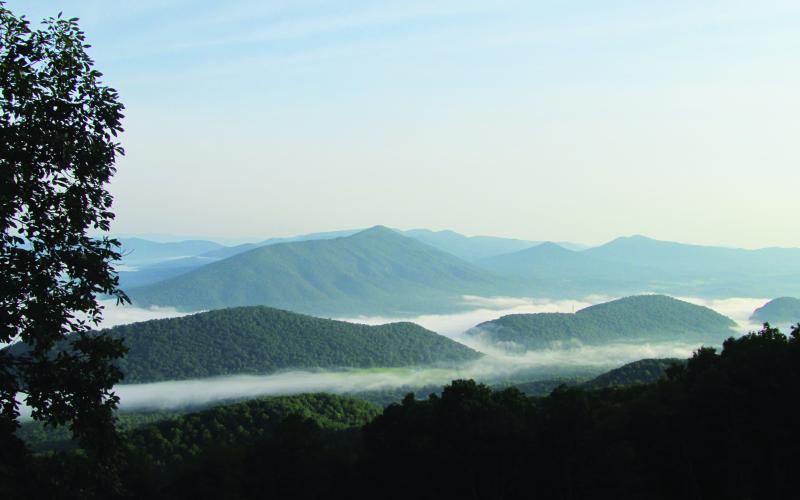 Morning fog hanging between the mountains is much more beautiful when viewed from above.