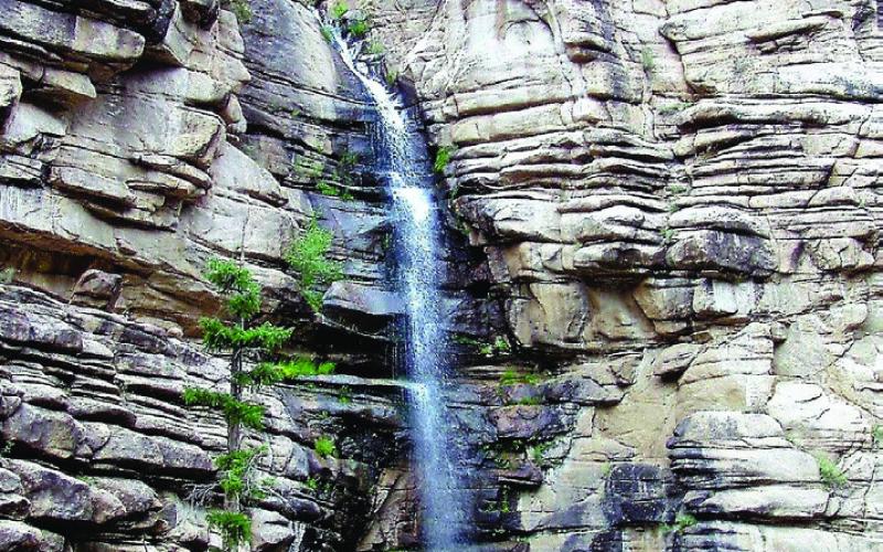The tour boat passes close to where Chepita Falls spills over the cliff.