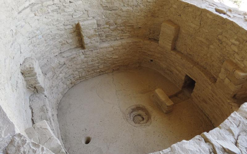 Notice the architecture of a kiva. Pilasters to support roof beams. A ledge for seating around the perimeter. A ventilation shaft on the right with a wind deflector to avoid disturbing the sacred fire located in the center ring.