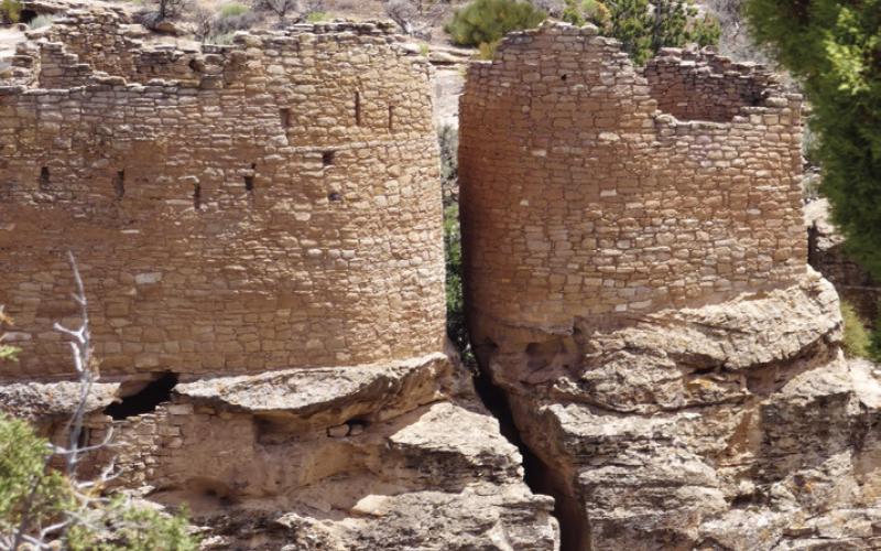 At Canyon of the Ancients/ Hovenweep, towers were built on the edge of the narrow canyon. Thousands of sites are still being discovered there. Though only 12 miles from Mesa Verde, it is not at 8,500 ft. so a tad warmer in summer.