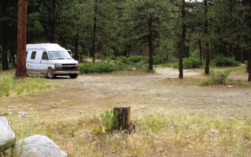 National forests allow boondocking in bare spots just off the gravel road—and often right on the banks of trout streams.