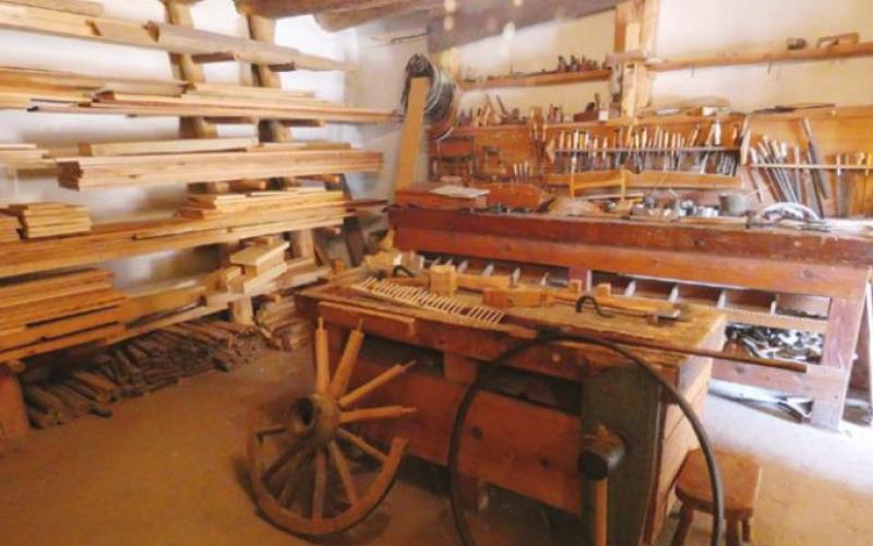 The well-equipped carpenter’s shop was the source of vital repairs for wagons and other equipment.