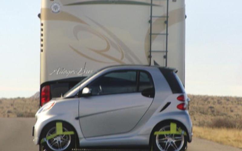 These RVers avoided towing a second vehicle by just “backpacking” it on their motor home.