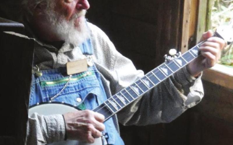 When the COVID put the miller on hiatus, he had nothing to do but strum his banjo and jaw with tourists. From a suitable distance, of course.