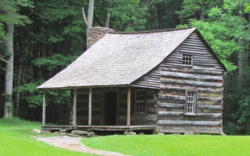 Like most Cove pioneers, Carter Shield placed his cabin back in the woods in order to preserve valuable crop land out on the floor of what is now meadow.