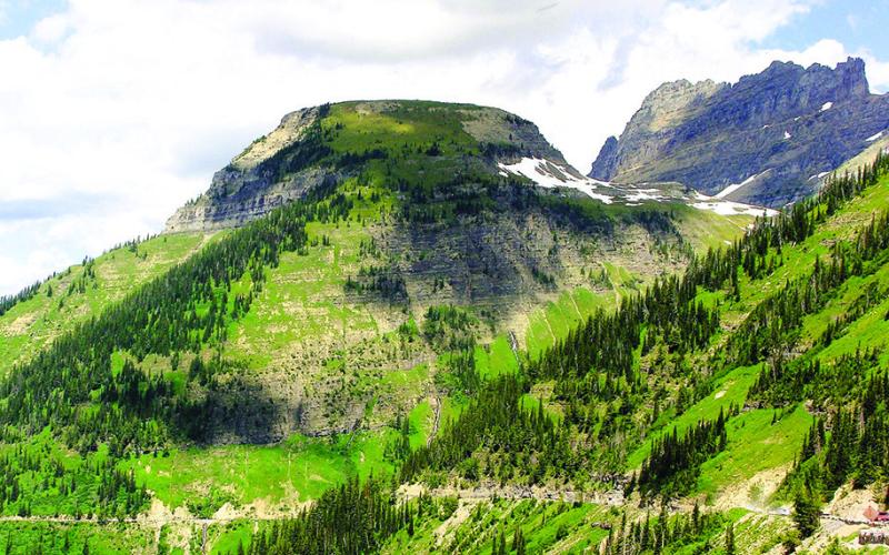 The Highline Trail is cut into the side of the mountain on its way to Granite Park Chalet.