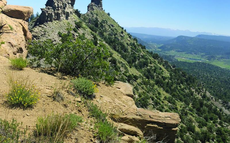 Chimney Rock, on the right, and Companion Rock are on the tip of a 7,000-ft.-high mesa.