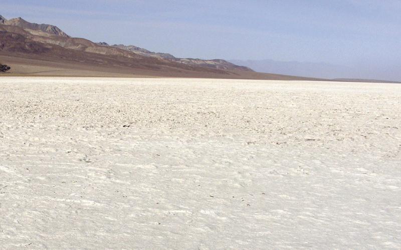 The salt flats in Badwater Basin might be mistaken for a vast frozen lake—if you are foolish enough to think that water freezes above 80 degrees.