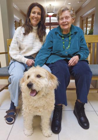 Phyllis Tucker and Heidi Hoffman with their buddy, Tucker.