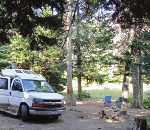 In most national forests there are clearings just off the gravel road where you are free to camp—or camp for free as the case may be.