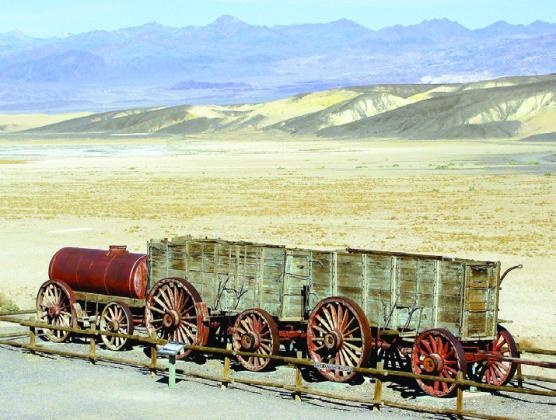Borax was transported in the famous 20-mule-team wagons. The water tank was extra weight but necessary for the survival of mules and men on the month-long round trip.