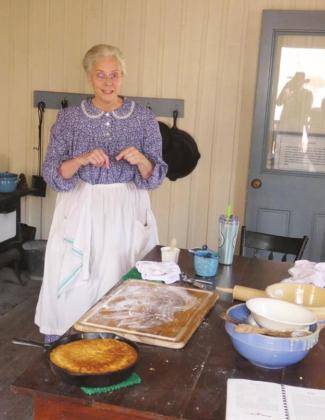 The cook for the Officers’ Mess had just taken out a skillet of cornbread and had a loaf of wheat bread scorching in the oven while she was distracted by visitors.