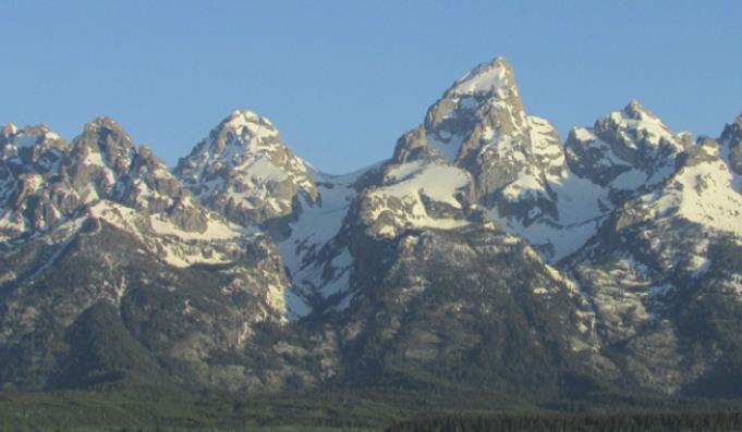 The Tetons, unobstructed by foothills, rise dramatically to form the western edge of Jackson Hole.