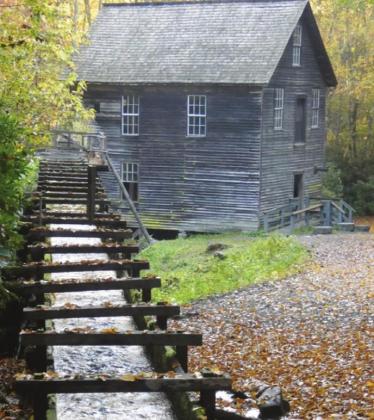 Power for the mill wheel is provided by water diverted via the mill race from a nearby stream and then returned to the stream.