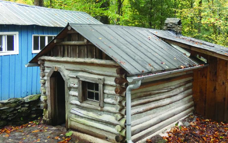 Children of one family had their own log cabin playhouse.