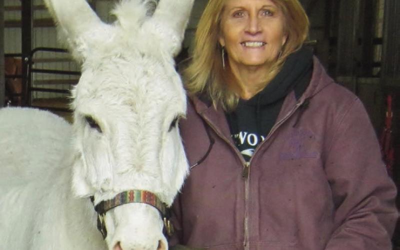 Nancy Swigart with Jack the donkey.